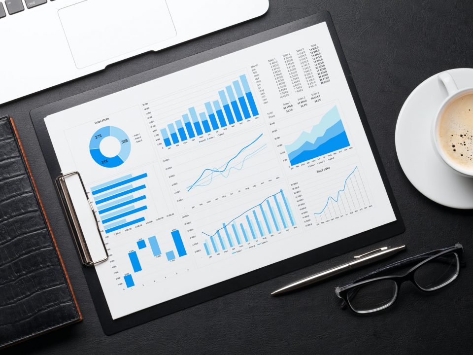 Office workplace table with charts